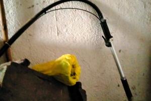 Braccio scuotitore per decespugliatore