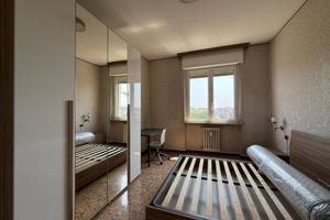 Stanza in appartamento di 113 m² a Milano