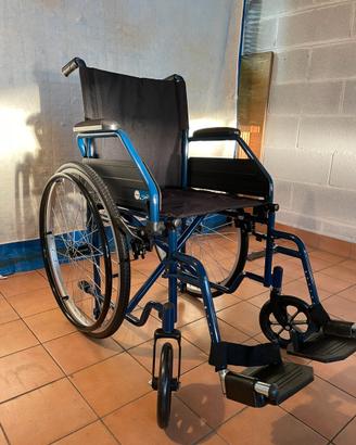 Carrozzina per disabili pieghevole