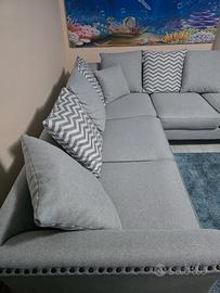 Divano angolare grigio 244x244
