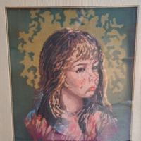raffigurazione di viso di bambina punto e croce