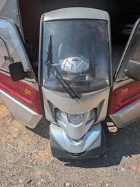 Scooter elettrico 4 ruote con abiltacolo chiuso