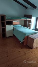 Arredo camera da letto con 2 letti singoli