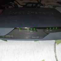 Router Cisco 877 con alimentatore e cavo