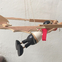 Giocattolo in legno da appendere al soffitto