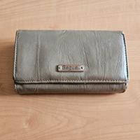 Portafoglio a libro Segue