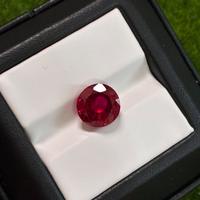 Painite rossa 6.65 ct taglio Round certificata