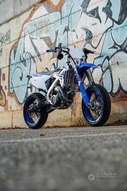 TM 125