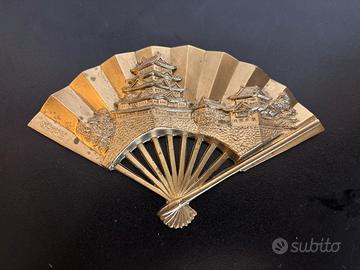 Ventaglio in ottone dorato decori orientali