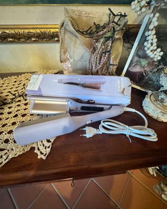 Piastra ondulatrice per  capelli
