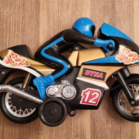 Moto anni 70 modellino gioco a molla giocattolo