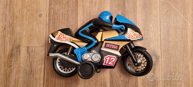 Moto anni 70 modellino gioco a molla giocattolo