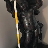 scultura lignea putto