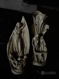 Coppia di sculture decorative in ceramica