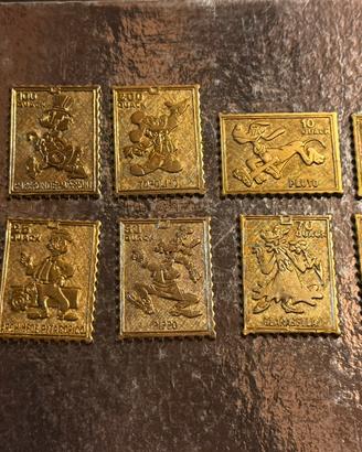 Lotto 10 francobolli metallici dorati Disney