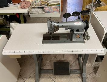 Macchina da cucire SINGER punto a giorno.
