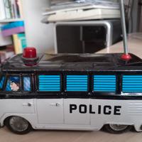 Autobus giocattolo di latta Police vintage