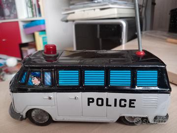 Autobus giocattolo di latta Police vintage