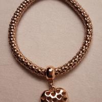 Bracciale color oro rosato con cuore.