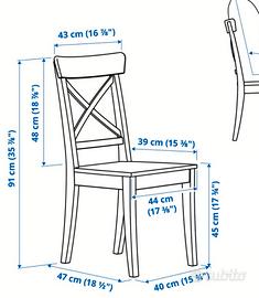 Tavolo tondo con sedie.