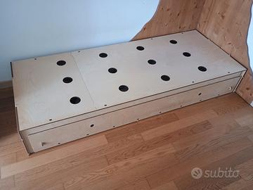 Letto in legno 80X200 cm.