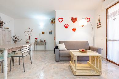 Appartamento con terrazzo vivibile e posto auto