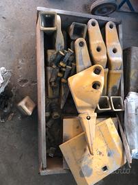 Denti e segmenti per CATERPILLAR