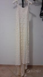 abito da sposa con pizzo macrame con coprispalle
