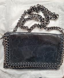 Pochette borsa tracolla in pelle e metallo donna 