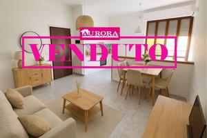 AMPIO E LUMINOSO APPARTAMENTO con GARAGE