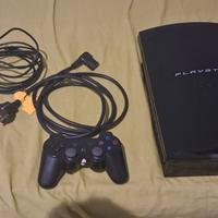 ps3 con giochi,controller,caricatore e alimentat.