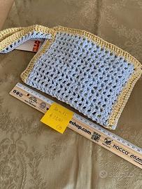 Pochette da polso fatta a mano all'uncinetto