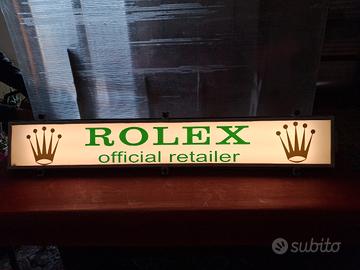 insegna luminosa pubblicitaria Rolex
