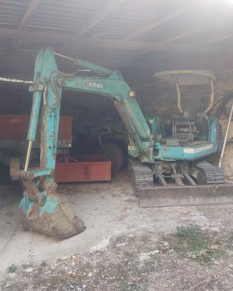 Scavatore, benna grigliata, Carrello per trasporto