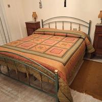 Letto in ferro battuto con testiera e pediera