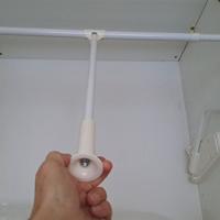 Asta appendiabiti basculante