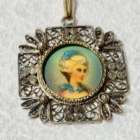 Ciondolo antico in oro 750 e argento