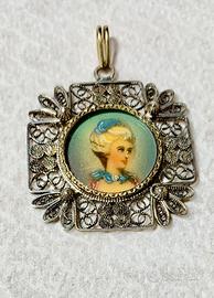 Ciondolo antico in oro 750 e argento
