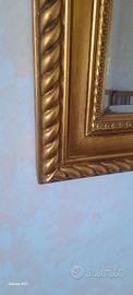 Specchio elegante cornice dorata