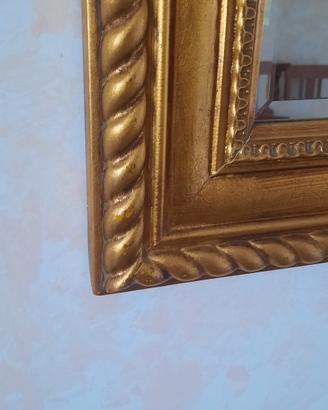 Specchio elegante cornice dorata