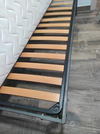 letto singolo a doghe in ferro battuto