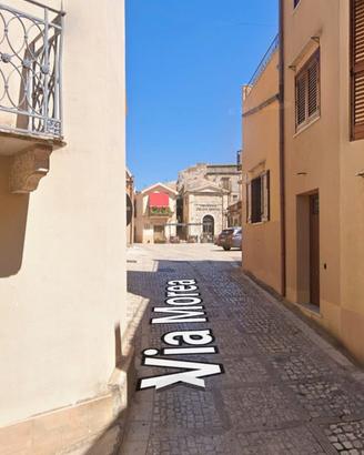 Immobile con Garage e Locale Commerciale