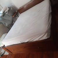 Letto matrimoniale legno massello con cassettoni