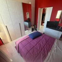 camera da letto + divano