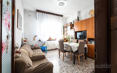 trilocale con studio e doppi servizi