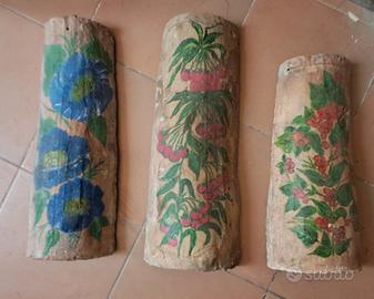 Tegole antiche lavorate e decorate a mano