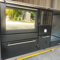 Termocucina a legna, cappa e tubo scarico