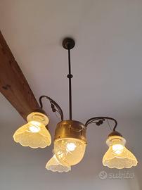 Lampadario  e le sue applique in ottone fatti mano