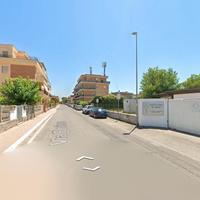 Fiumicino trilocale con giardino e p.auto