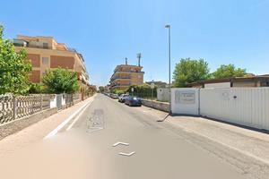 Fiumicino trilocale con giardino e p.auto